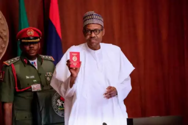 PHOTOS: Buhari launches new Nigerian passport, Red color With 10-year Validity